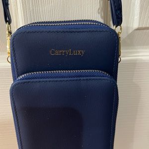 Carry Luxy Woman’s small cross body bag! Royal blue, 3 zippered compartments.